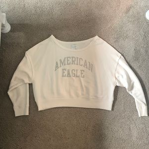 Beige and grey sweater/long sleeve. Off the shoulder a bit. American eagle.